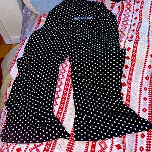 The brand is Arolina and the size is large. Polkadot black and white.